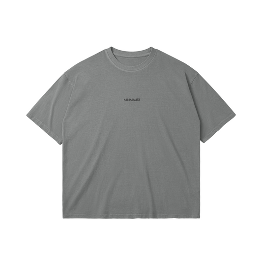 Flat lay front view of Oversized unisex cotton t-shirt in light gray – Minimalist design – Aube Studio
