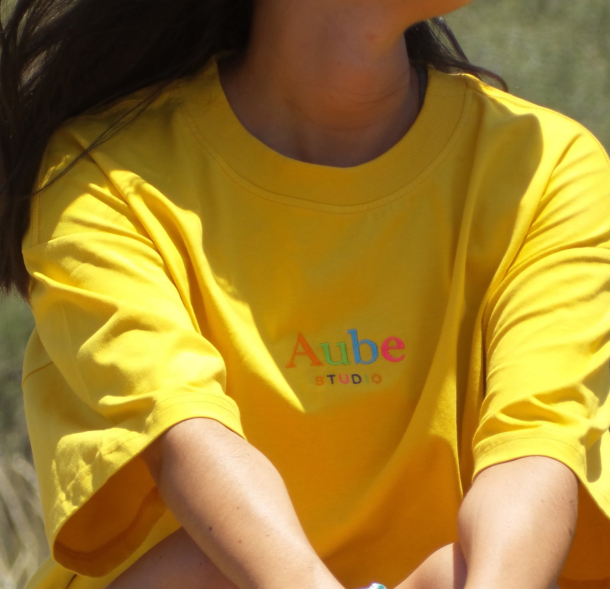 Aube 90’s by Aube Studio in Yellow - Worn front view - Unisex oversized fit - Aube Studio